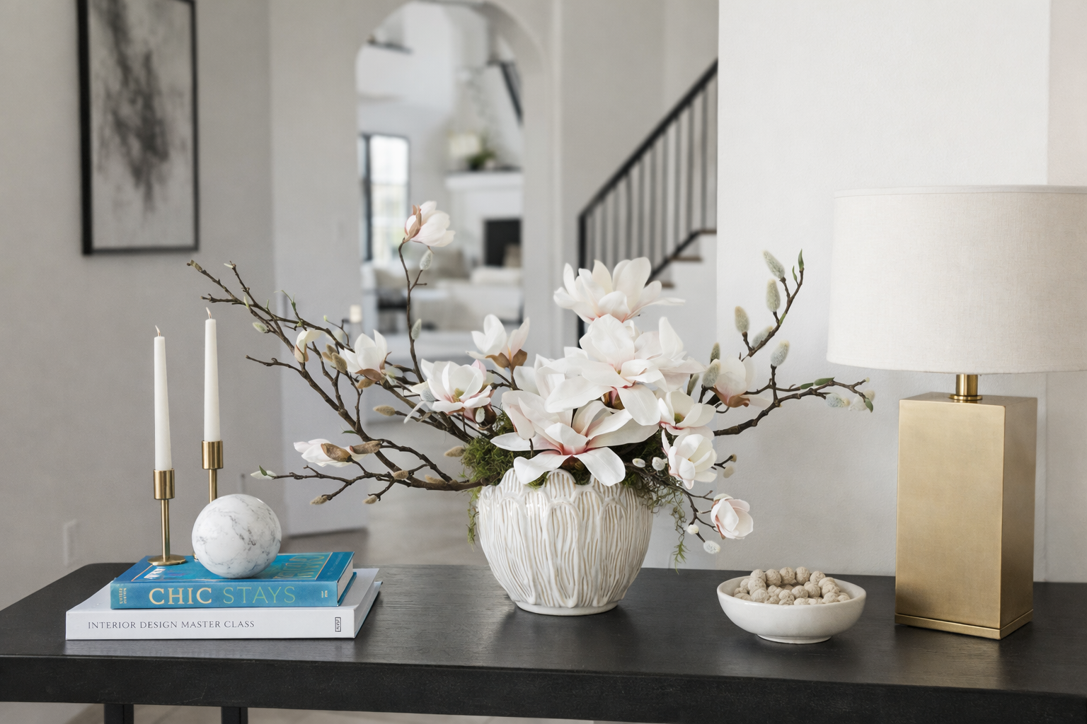realistic artificial flower arrangement in entryway